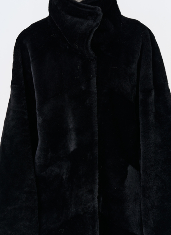 Женская натуральная дубленка черного цвета